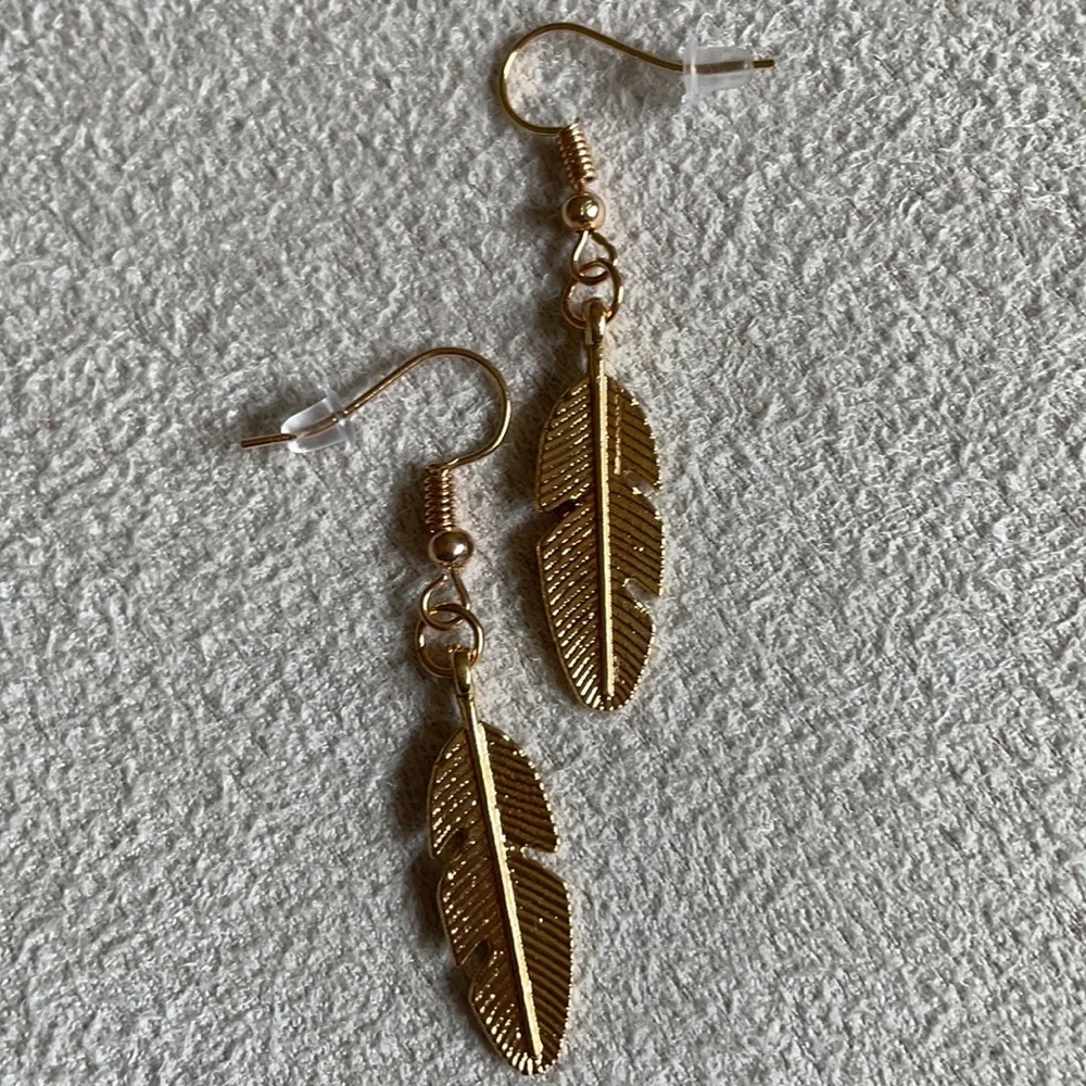 Gold leaf dangle earrings